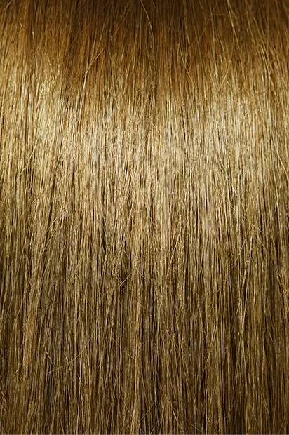 High quality natural looking human hair extensions in a beautiful golden brown. Achieve real hair volume seamlessly.