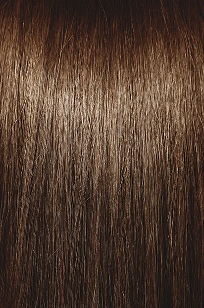 Natural looking human hair extensions offer a beautiful and seamless transformation for enhanced hair volume.